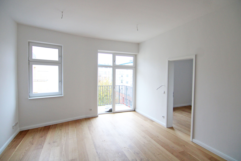 Wohnzimmer mit off. Küche