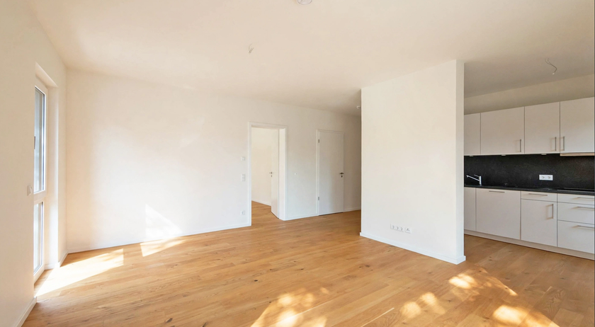 Wohnzimmer mit offener Küche