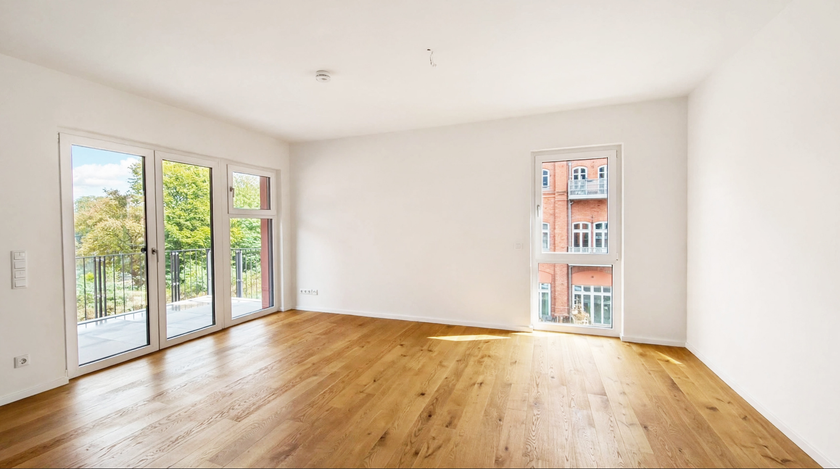 Wohnzimmer mit offener Küche